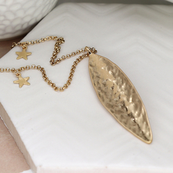 Worn Faux Gold Hammered Long Leaf Necklace With Stars On The Chain