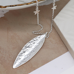 Worn Silver Plated Hammered Long Leaf Necklace With Stars On The Chain